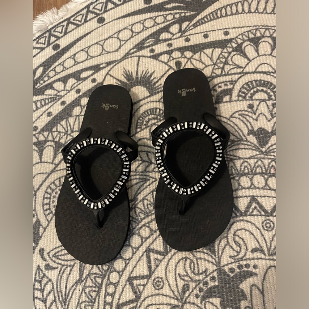 Sanuk flip flops. Worn once